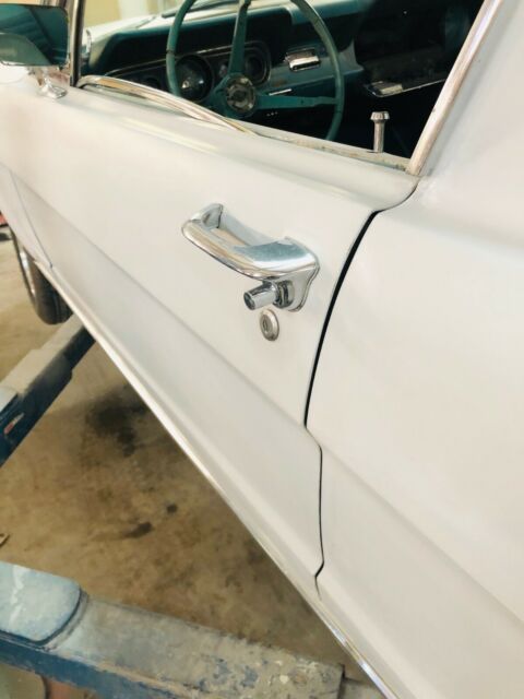 1966 primer Ford Mustang Fastback