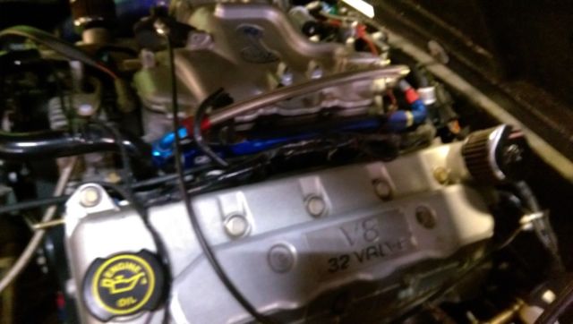 1966 candy apple red Ford Mustang fastback