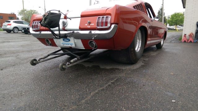 1966 candy apple red Ford Mustang fastback