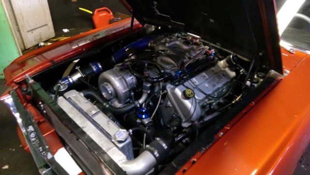 1966 candy apple red Ford Mustang fastback