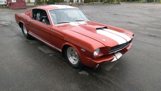 1966 candy apple red Ford Mustang fastback