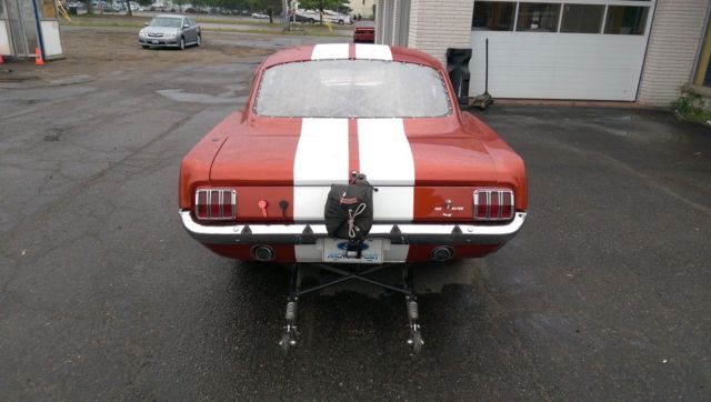 1966 candy apple red Ford Mustang fastback