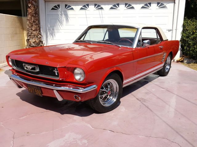 1966 red Ford Mustang Coupe