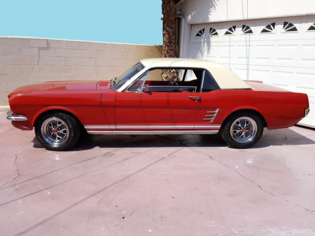 1966 red Ford Mustang Coupe