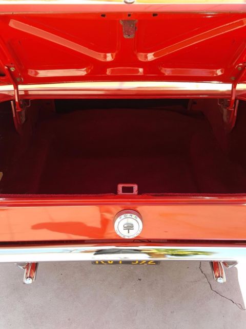 1966 red Ford Mustang Coupe