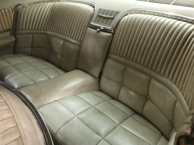 1966 gold Ford Thunderbird