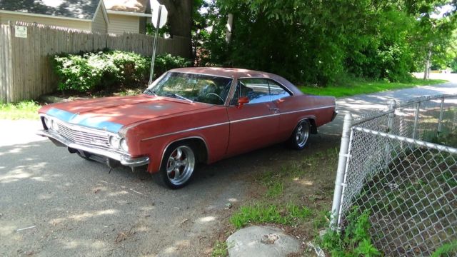 1966 Red Chevrolet Impala Coupe
