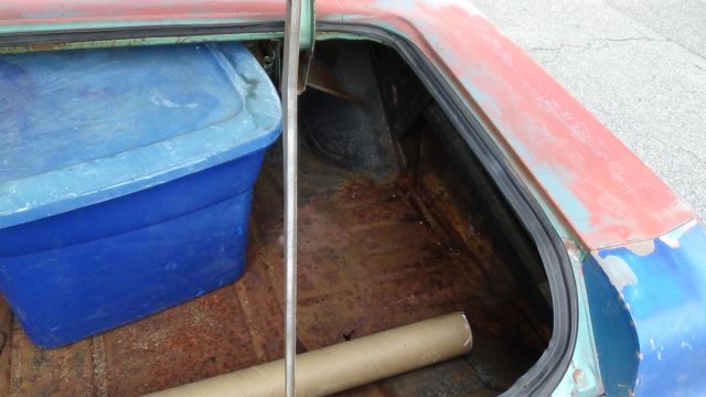 1966 Red Chevrolet Impala Coupe