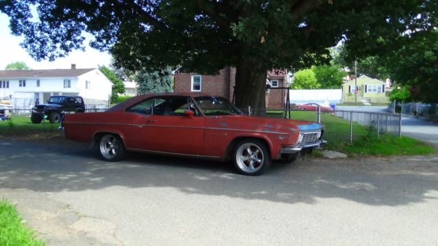1966 Red Chevrolet Impala Coupe