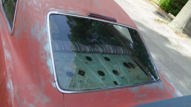 1966 Red Chevrolet Impala Coupe