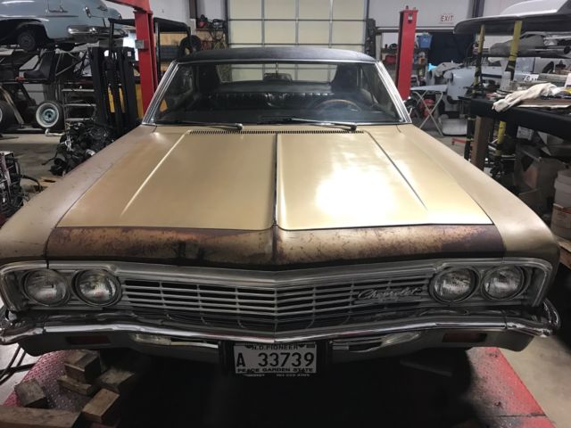 1966 gold Chevrolet Impala Coupe