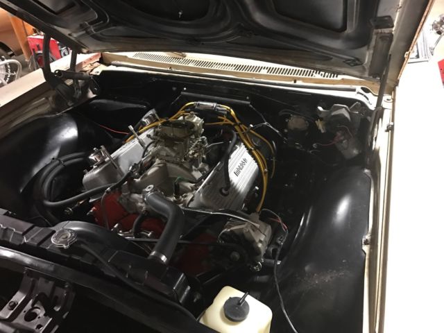 1966 gold Chevrolet Impala Coupe