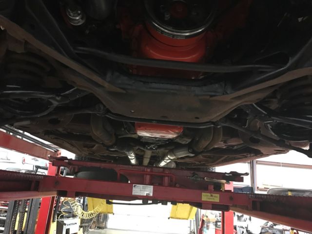 1966 gold Chevrolet Impala Coupe