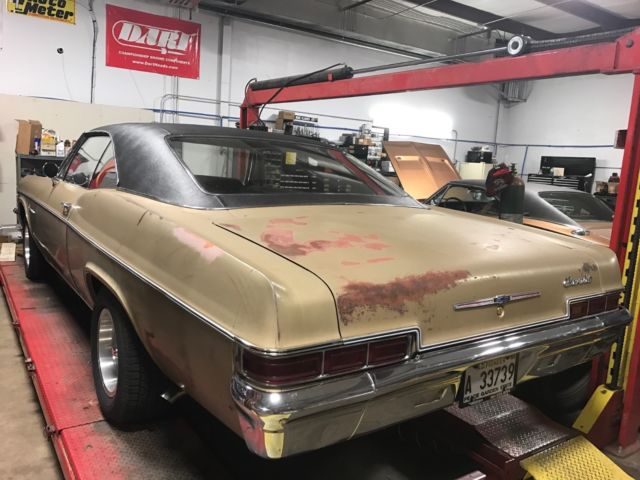 1966 gold Chevrolet Impala Coupe