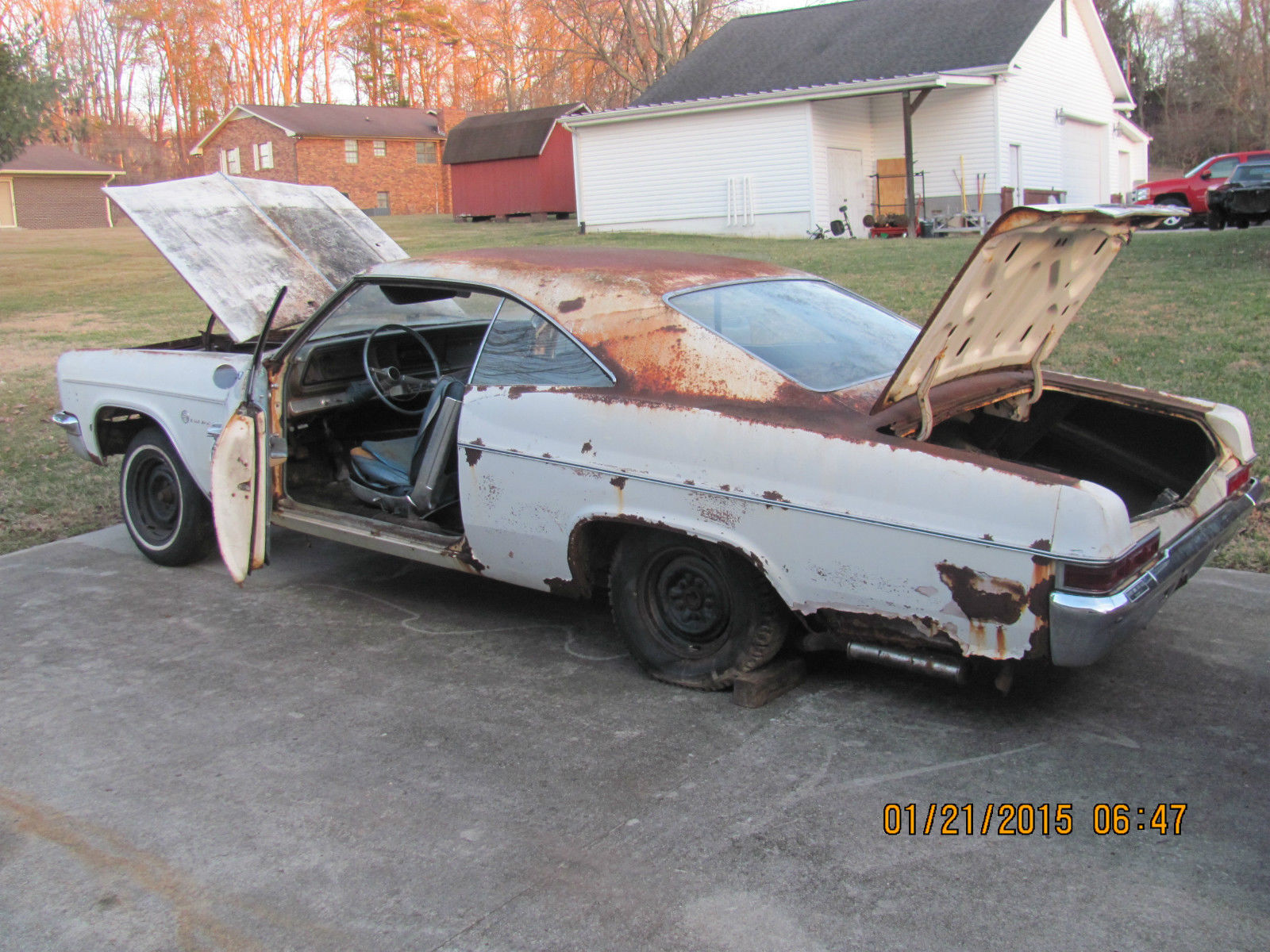 1966 White Chevrolet Impala Coupe