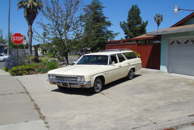 1966 Yellow Chevrolet Impala Station Wagon