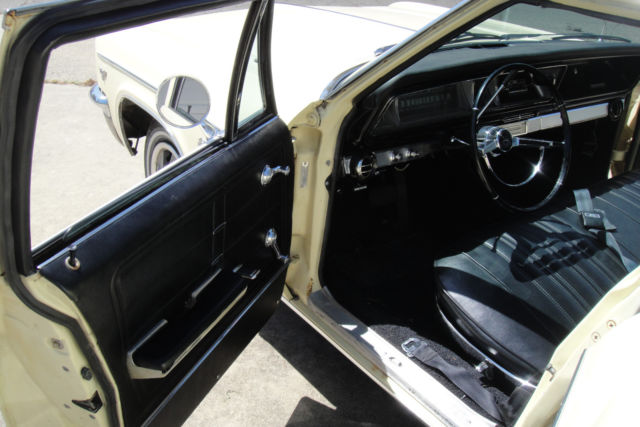 1966 Yellow Chevrolet Impala Station Wagon