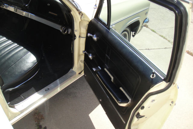 1966 Yellow Chevrolet Impala Station Wagon