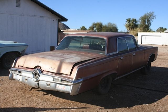 1966 Red Chrysler Imperial 4 door hard top