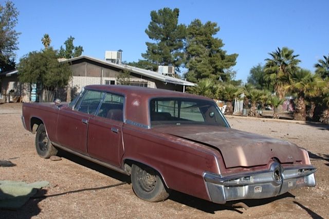 1966 Red Chrysler Imperial 4 door hard top