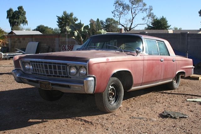 1966 Red Chrysler Imperial 4 door hard top