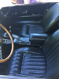 1966 golden sand Jaguar E-Type Coupe