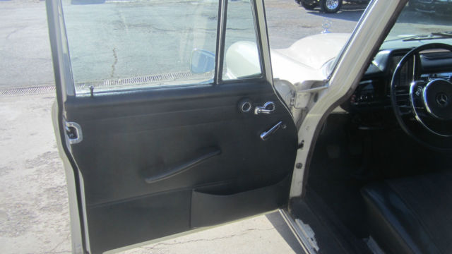 1966 Cream Mercedes-Benz 200-Series Sedan