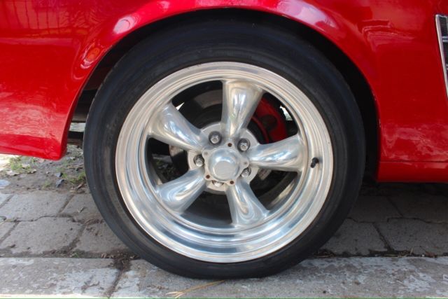 1966 red Ford Mustang Sedan
