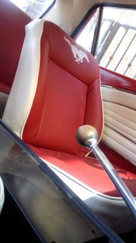 1966 red Ford Mustang Sedan