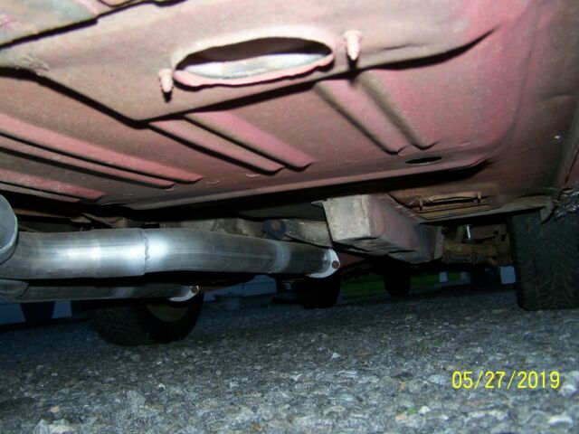 1966 Burgundy Ford Mustang Fastback