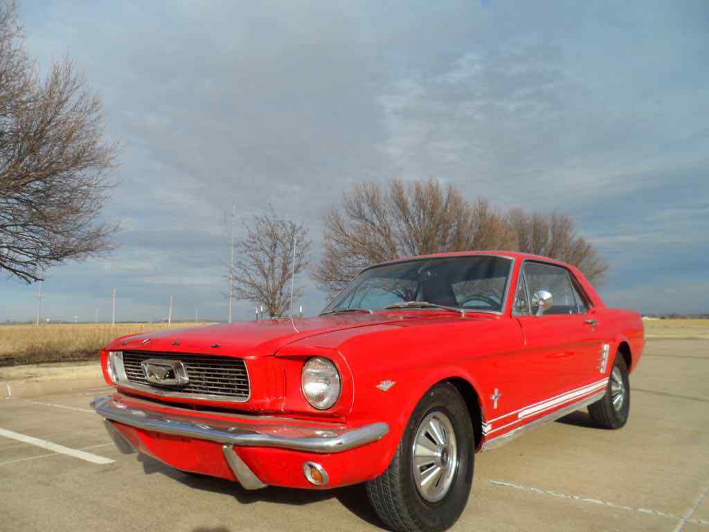 1966 red Ford Mustang