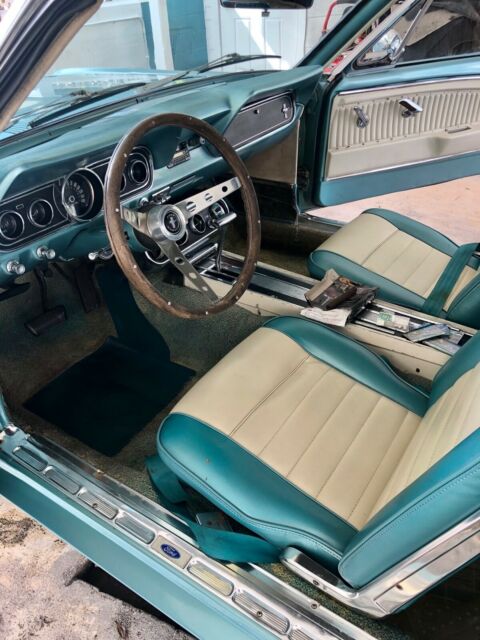 1966 turquoise Ford Mustang