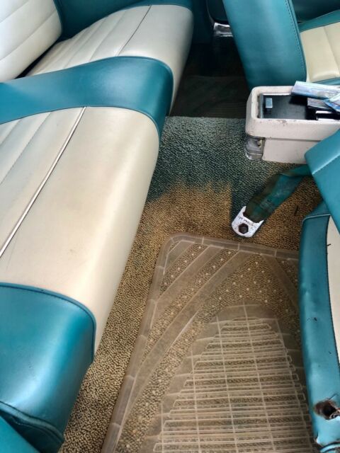 1966 turquoise Ford Mustang