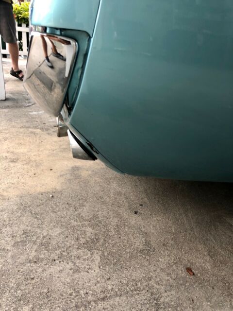 1966 turquoise Ford Mustang