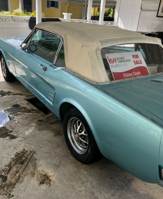 1966 turquoise Ford Mustang