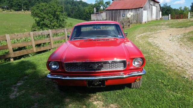 1966 signal flare red Ford Mustang coupe