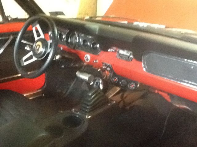 1966 signal flare red Ford Mustang coupe