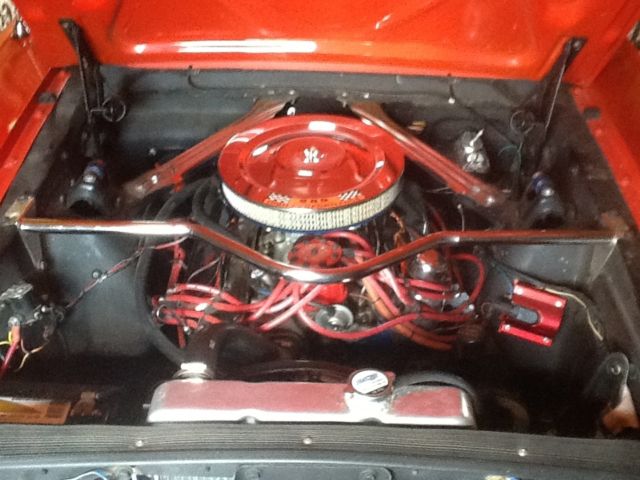 1966 signal flare red Ford Mustang coupe