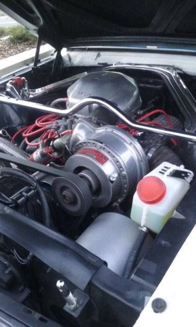 1966 white Ford Mustang Fastback