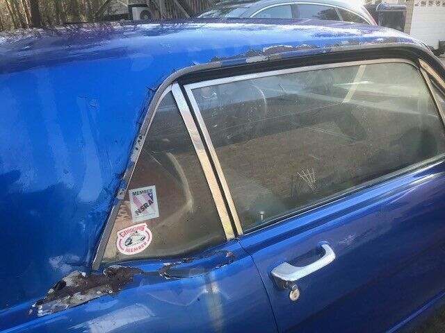 1966 blue Ford Mustang Coupe