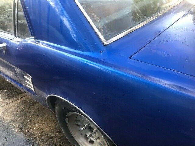 1966 blue Ford Mustang Coupe