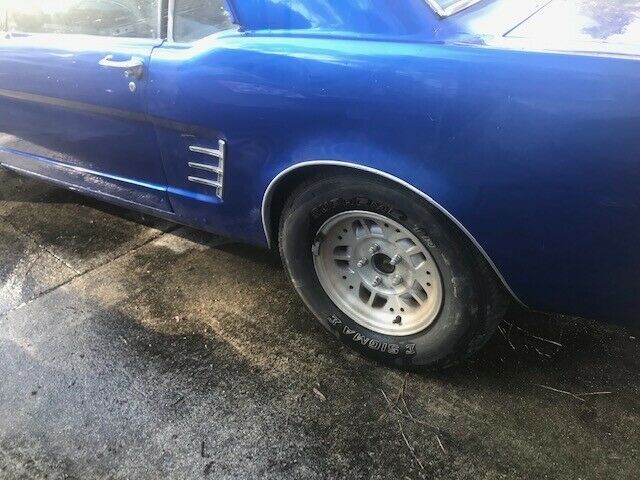 1966 blue Ford Mustang Coupe