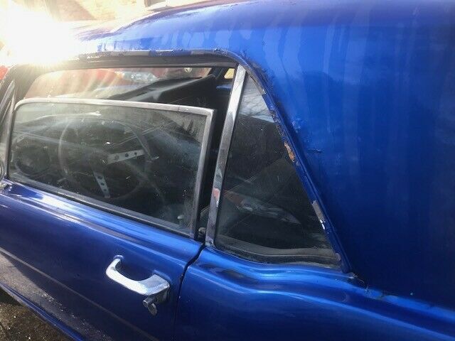 1966 blue Ford Mustang Coupe