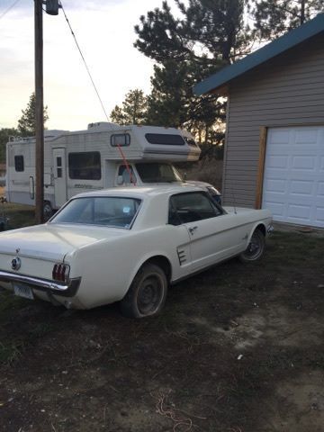 1966 white Ford Mustang Coupe