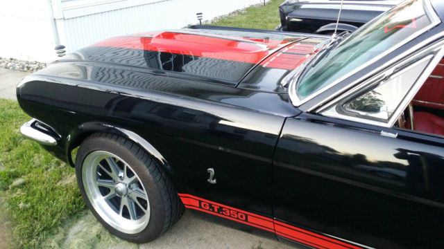 1966 Raven black with red Shelby gt 350 stripping Ford Mustang Coupe