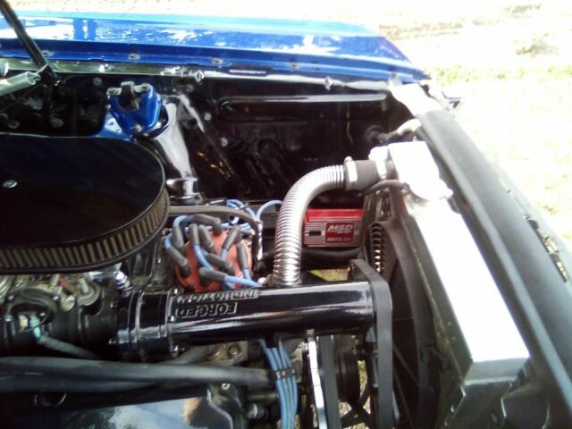 1966 Super jet black on bottom on bottom and impulse blue on top Ford Mustang Coupe