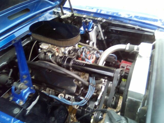 1966 Super jet black on bottom on bottom and impulse blue on top Ford Mustang Coupe