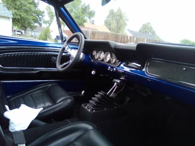 1966 Super jet black on bottom on bottom and impulse blue on top Ford Mustang Coupe