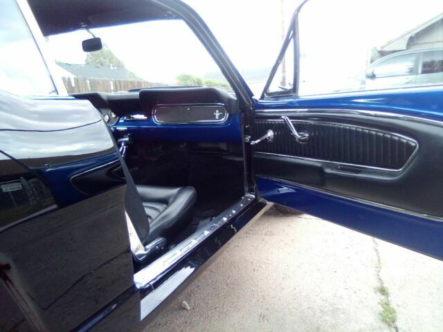 1966 Super jet black on bottom on bottom and impulse blue on top Ford Mustang Coupe