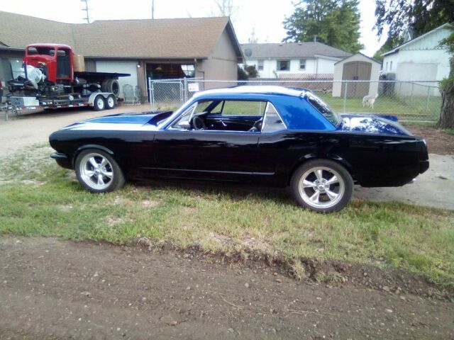 1966 Super jet black on bottom on bottom and impulse blue on top Ford Mustang Coupe
